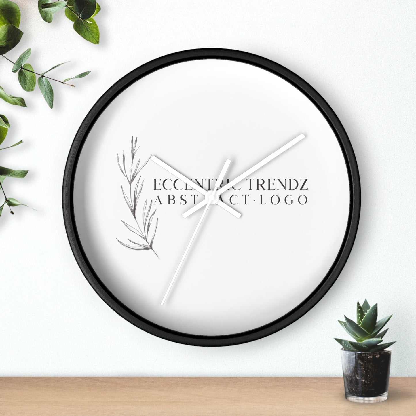 Eccentric Trendz Abstract Logo - Minimal Botanical Wall Clock