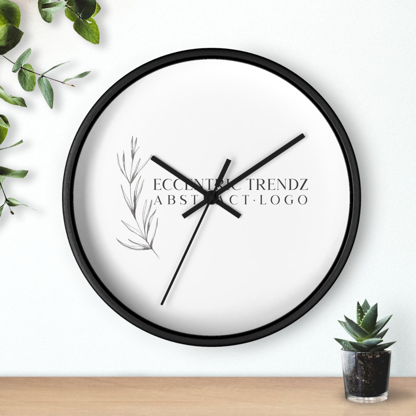 Eccentric Trendz Abstract Logo - Minimal Botanical Wall Clock