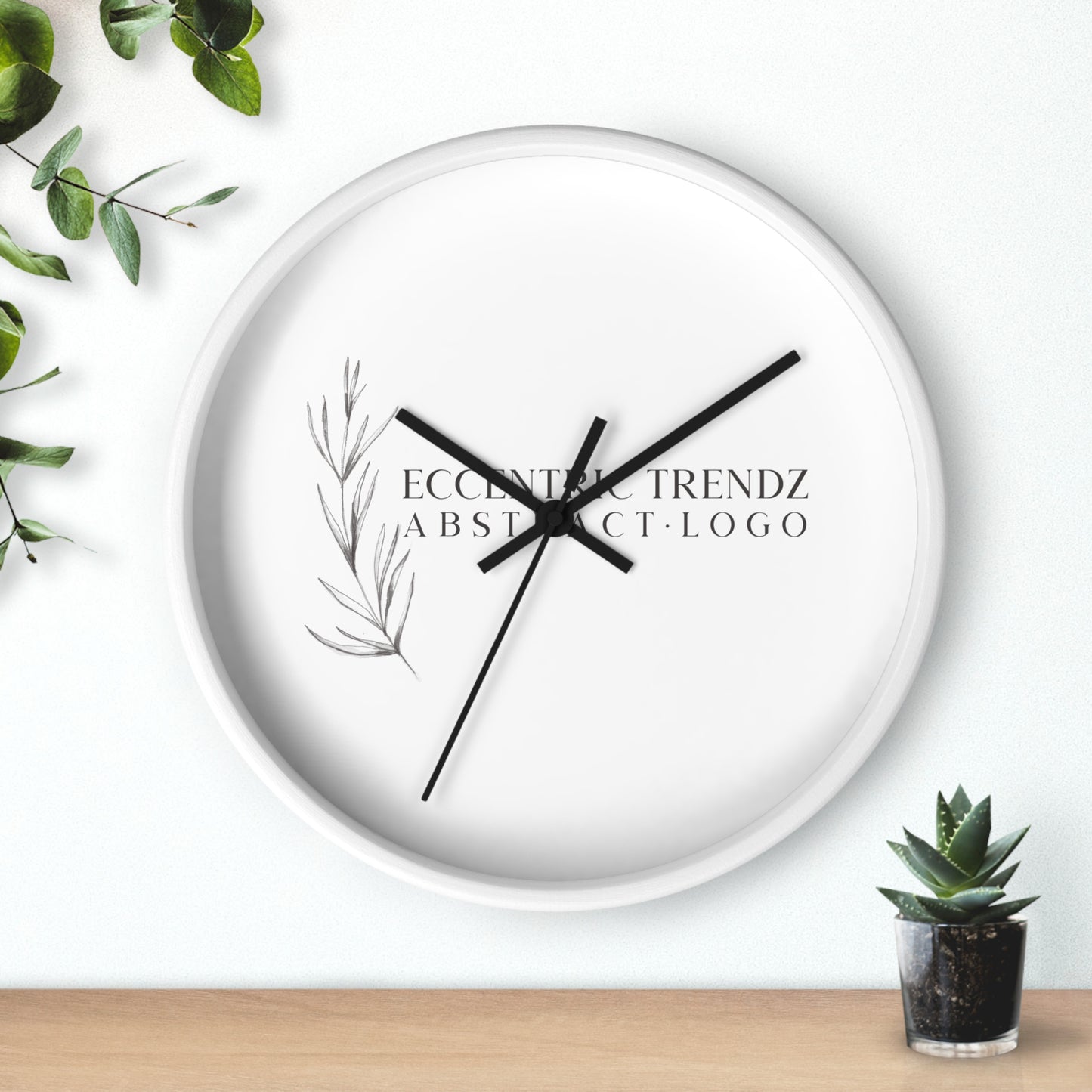 Eccentric Trendz Abstract Logo - Minimal Botanical Wall Clock