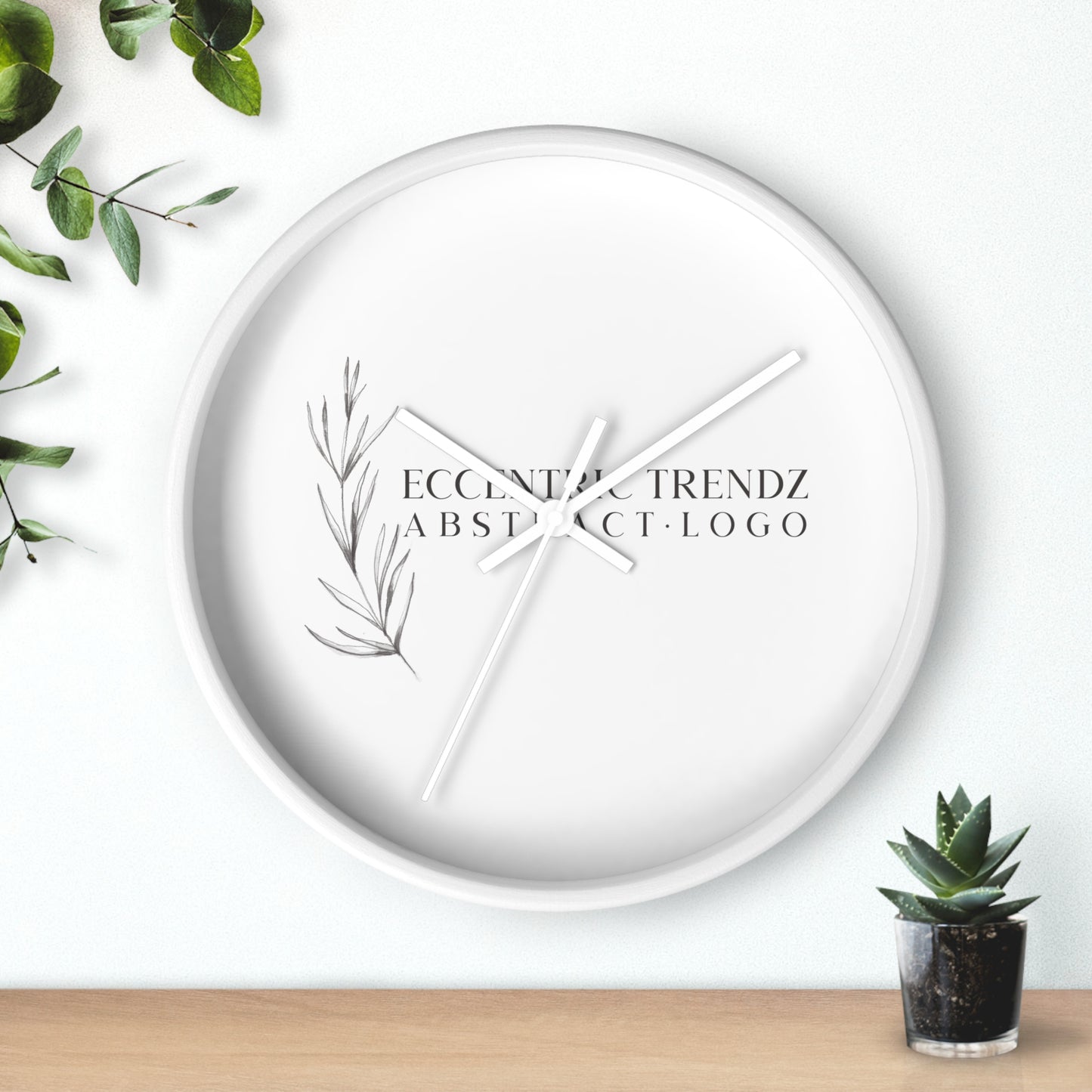 Eccentric Trendz Abstract Logo - Minimal Botanical Wall Clock